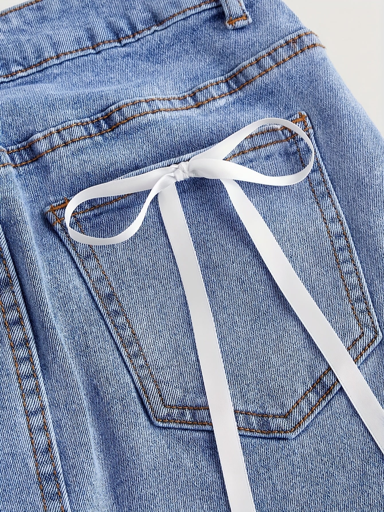 Damen Jeans Minirock mit Taschen und Schleifendetail – Eleganter Freizeit-Look - Image 4
