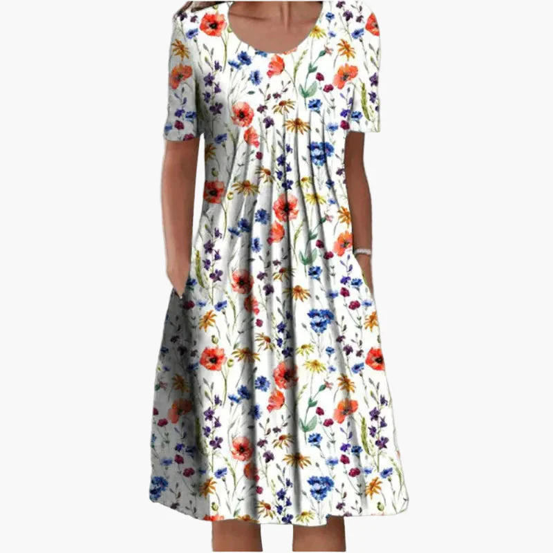 Damen Sommerkleid mit Blumenmuster – Bequemes Freizeitkleid mit Taschen und Kurzarm