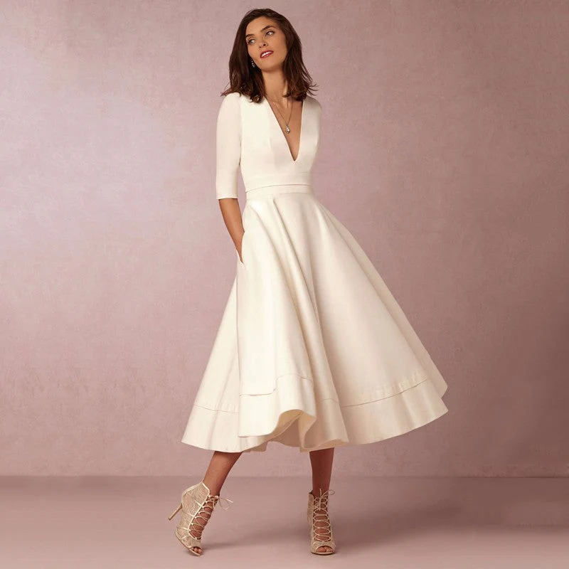 Jasmine – V-Ausschnitt Kleid im Retro 60er Swing Stil